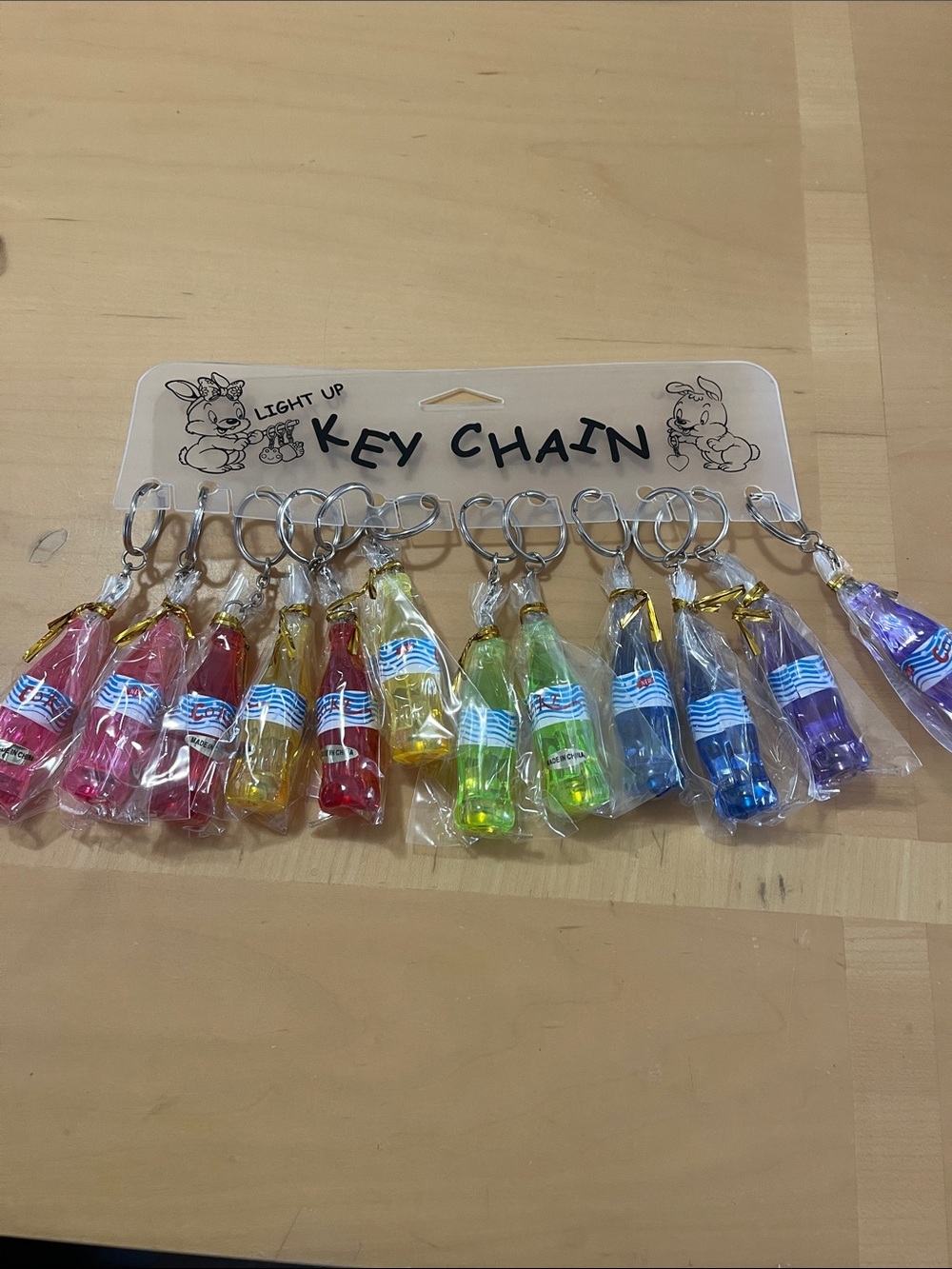 12 Light Up Bottle Keychain - Multicolor
